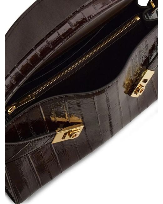 Bolso de hombro Hug mediano con hebilla Gancini Ferragamo de color Black