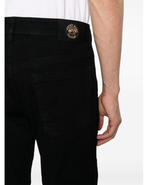 Versace Straight-Leg-Jeans mit Einsätzen in Black für Herren