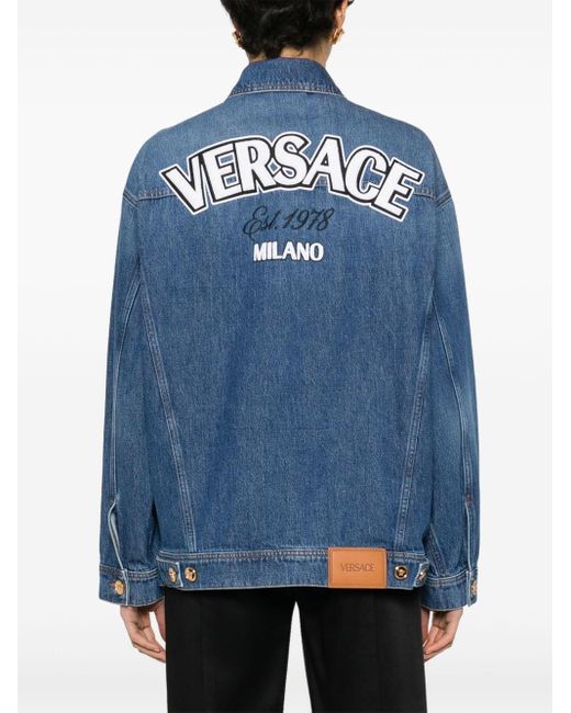 Veste en jean à logo brodé Versace en coloris Blue