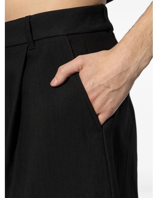 Studio Nicholson Black Ellis Pleated Trousers for men