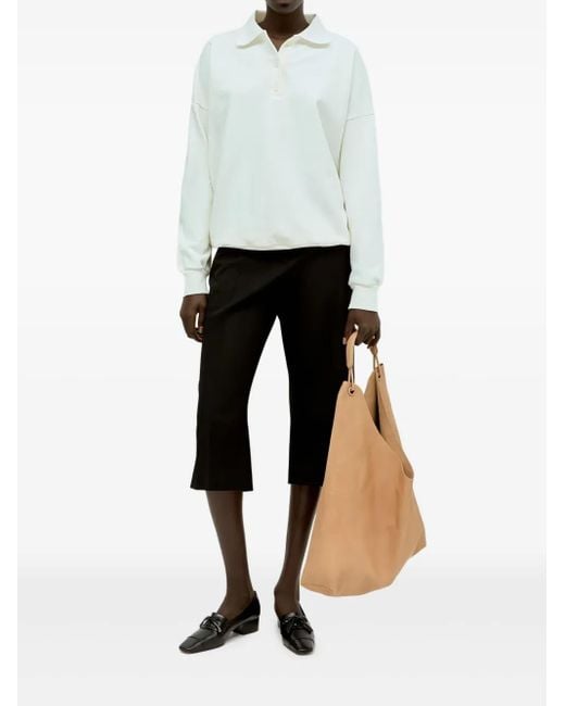 The Row Black Flared Crop Trousers