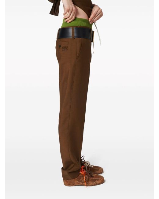 Pantalones con logo bordado Miu Miu de color Brown