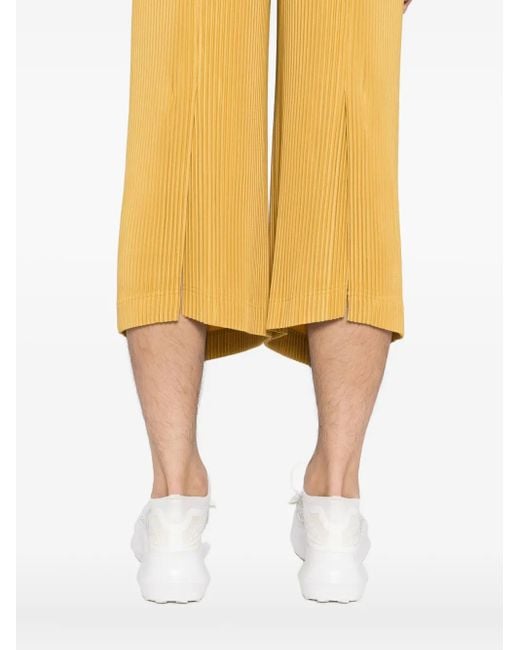 Homme Plissé Issey Miyake Yellow Mc June Pleated Trousers for men