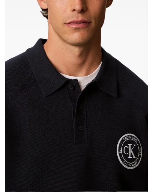 Calvin Klein Blue Varsity Logo-Patch Polo Sweater for men
