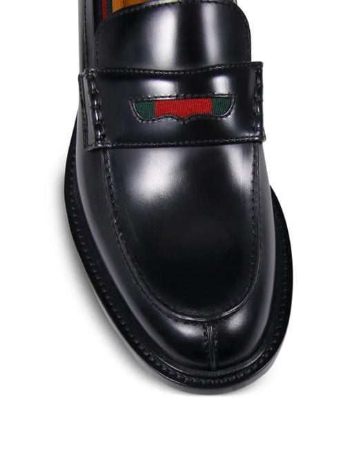Gucci Black Penny-Strap Loafers for men