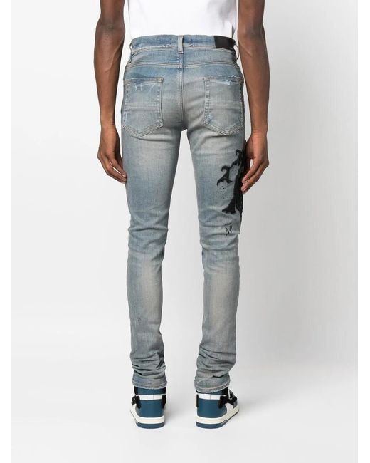 Amiri Blue Logo-Embroidered Skinny Jeans for men