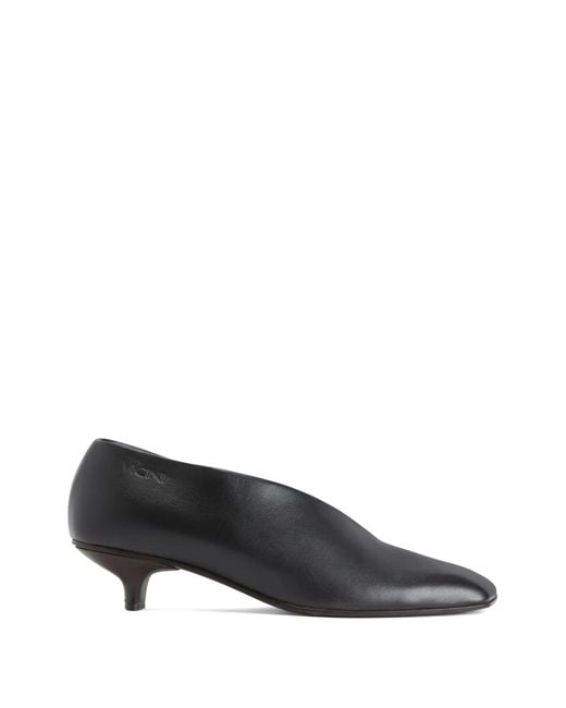 Vicini Black Asymmetrical-Cutout Square Pumps