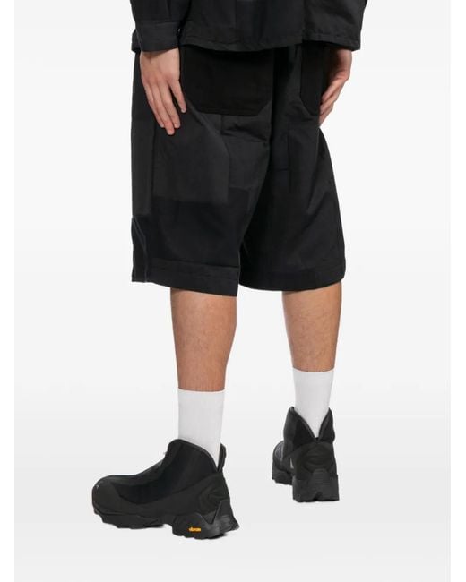 Comme des Garçons Black Patchwork Shorts for men