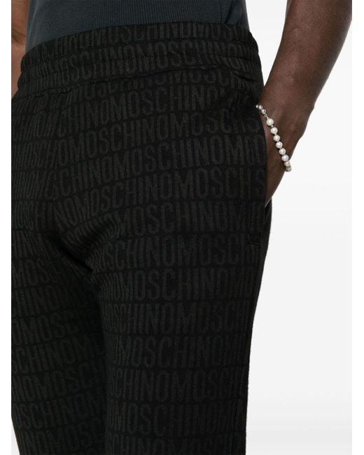 Pantalones de chándal con logo en jacquard Moschino de hombre de color Black