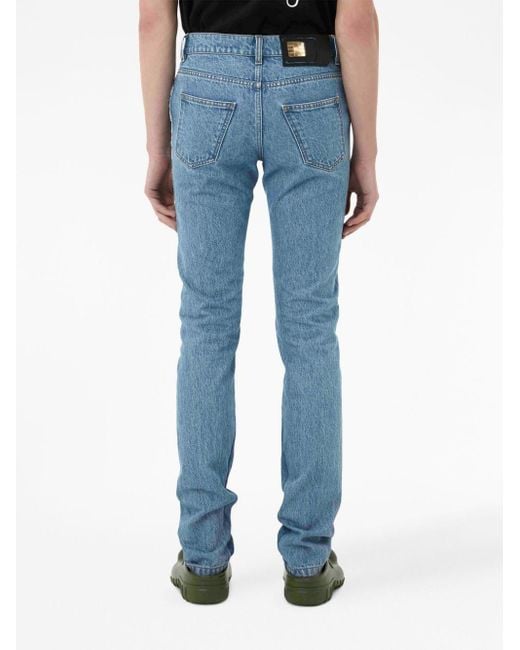 Jeans slim con applicazione di J.W. Anderson in Blue da Uomo