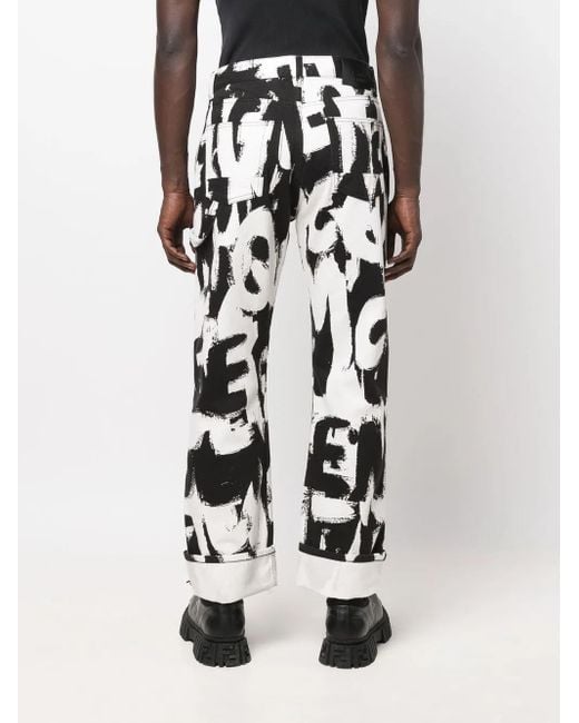 McQueen Black Graffiti-Print Straight-Leg Jeans for men