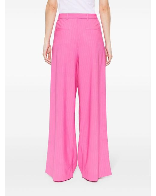 Pantaloni svasati gessati di GIUSEPPE DI MORABITO in Pink