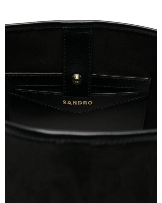 Bolso shopper con charm Sandro de color Black