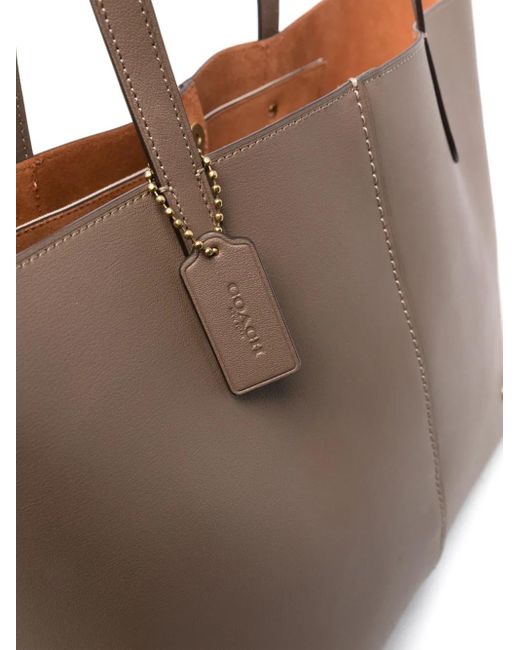 COACH Logo-Charm Tote Bag in Brown | Lyst