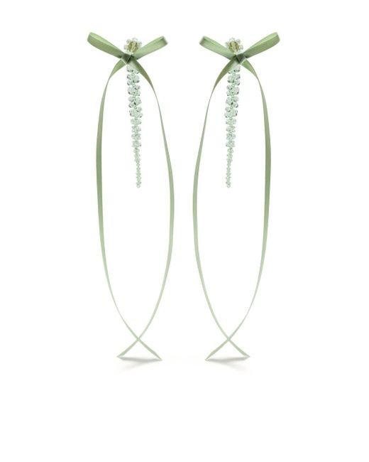 Bow ribbon drip earrings di Simone Rocha in White