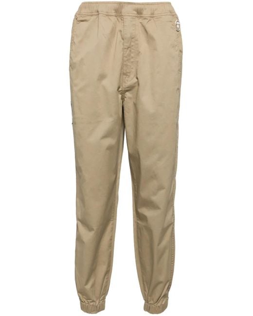 Aape By A Bathing Ape Natural Moonface Logo Pants for men