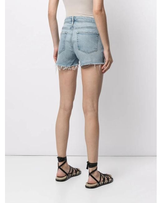 Short En Jean À Effet Usé FRAME en coloris Blue