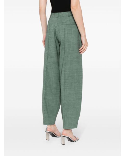 Pantalones ajustados con pinzas Stella McCartney de color Green