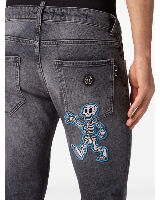 Jeans slim con applicazione di Philipp Plein in Blue da Uomo