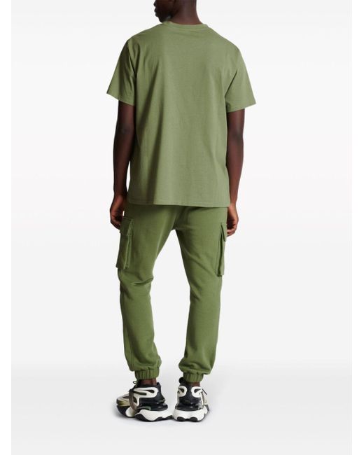 T-shirt en coton à logo floqué Balmain pour homme en coloris Green