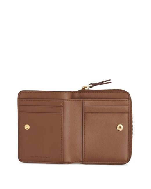 Le mini portefeuille compact en argan Marc Jacobs en coloris Brown
