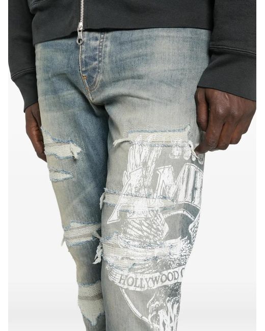 Amiri Blue Ripped Print Jeans for men
