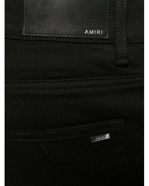 Amiri Black Broken Skinny Jeans for men