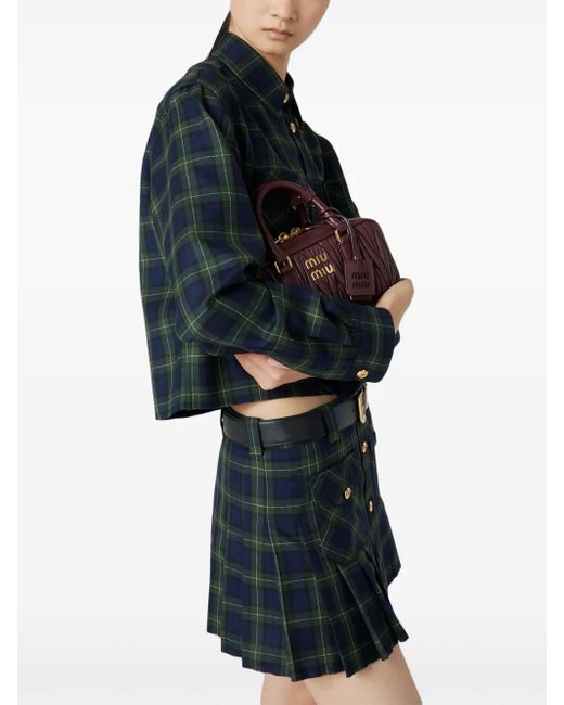 Minigonna A Pieghe Tartan di Miu Miu in Blue