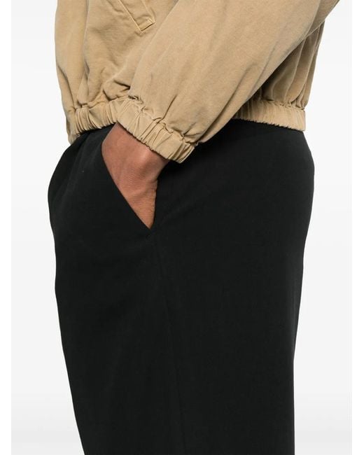 Auralee Black Pleated-Detail Trousers for men