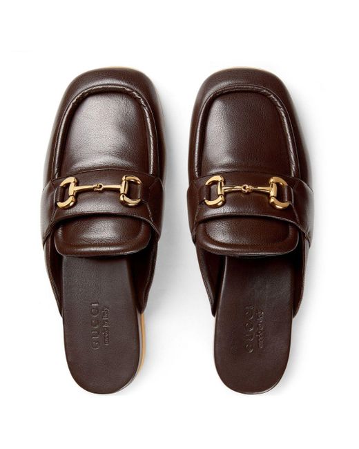 Slippers con detalle horsebit Gucci de hombre de color Brown