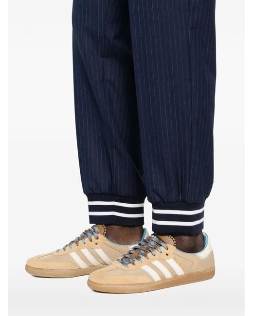Moschino Blue Relaxed-Fit Pinstripe Trousers With Sporty Ribbed Cuffs for men