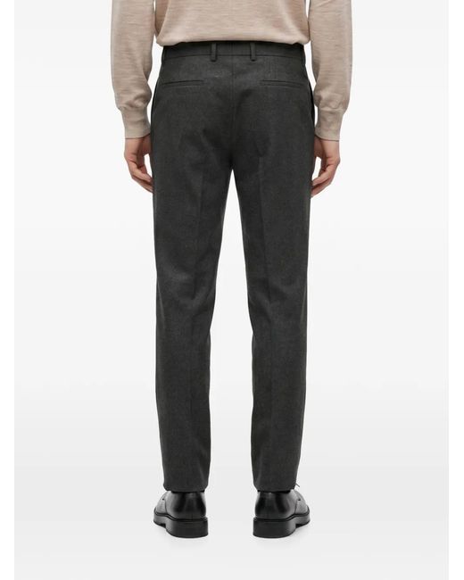 Brunello Cucinelli Black Pleated Virgin-Wool Trousers for men