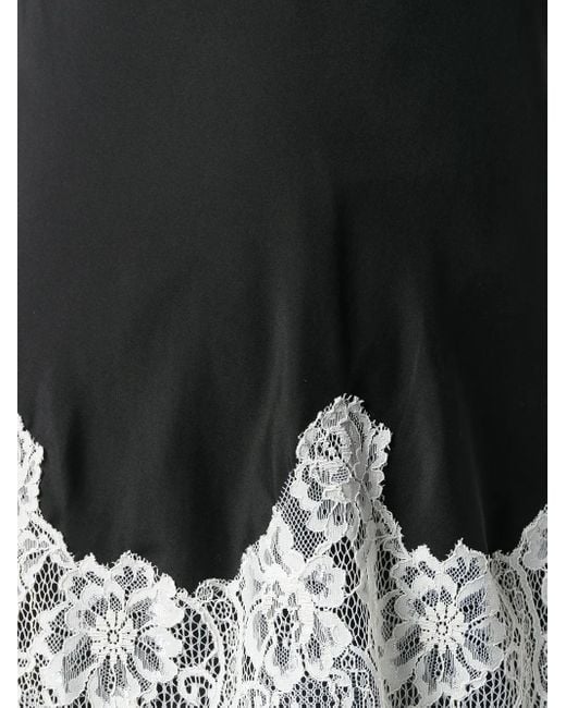 Gold Hawk Top Met Detail Van Kant in het Black