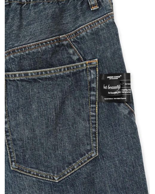 Undercover Blue Panelled Denim Shorts for men