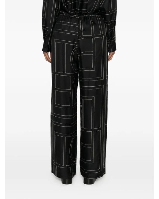 Totême Black Monogram-Print Wide-Leg Trousers