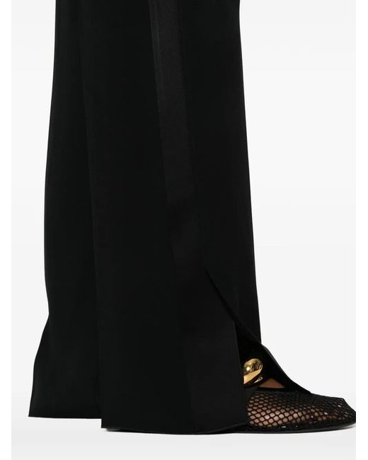 Pantalones Con Diseño Abierto En El Bajo Forte_forte de color Black
