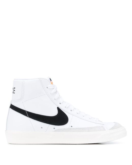 high top nike white shoes