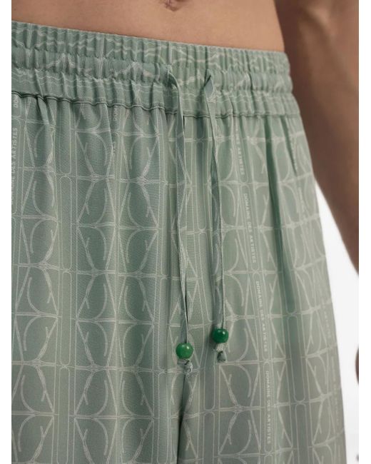 Domaine Des Artistes Green Lion-Embellished Patterned Silk Trousers for men