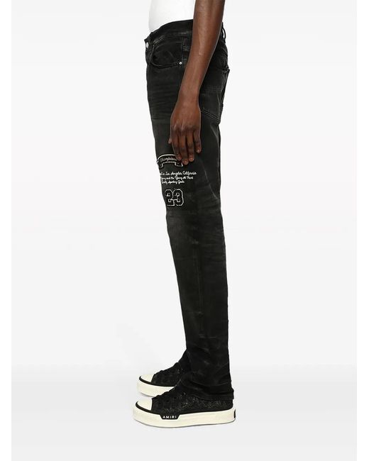 Amiri Black Logo Patch Jeans for men