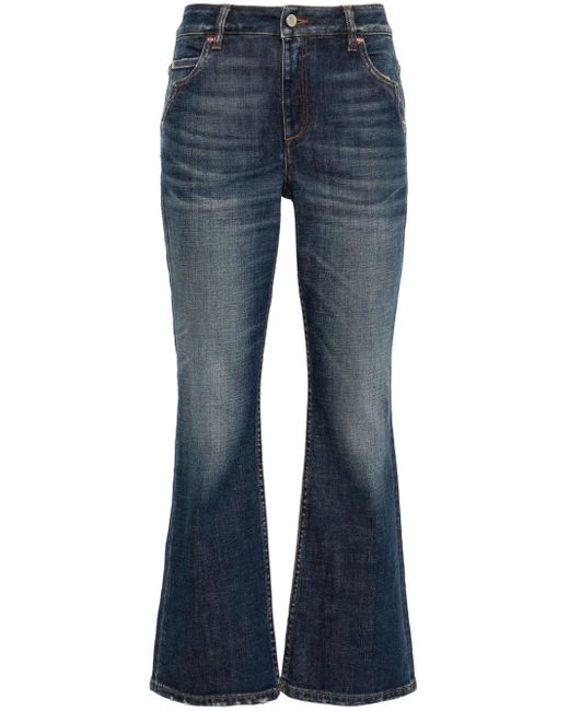 Jeans affusolati con effetto schiarito di Dorothee Schumacher in Blue