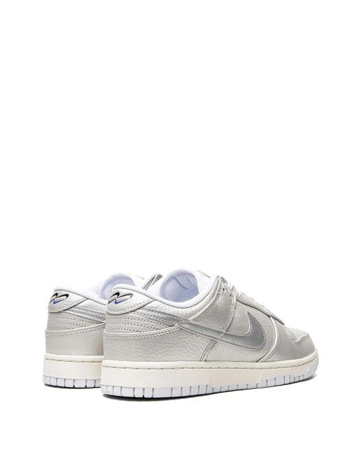 Nike White Dunk Low "Metallic" Sneakers