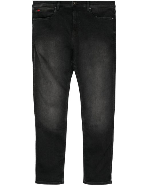 Jeans slim a vita media di HUGO in Black da Uomo