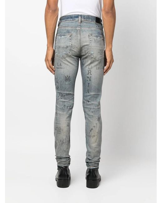 Amiri Blue Slim-Fit Illustration Print Jeans for men