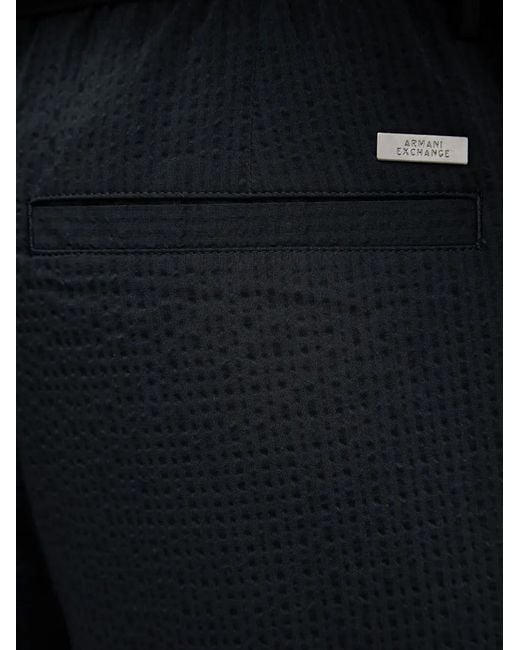 ARMANI EXCHANGE Black Seersucker-Textured Logo-Plaque Trousers for men