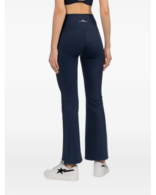 AAPE BY A BATHING AP Blue Logo-Print Flared Trousers