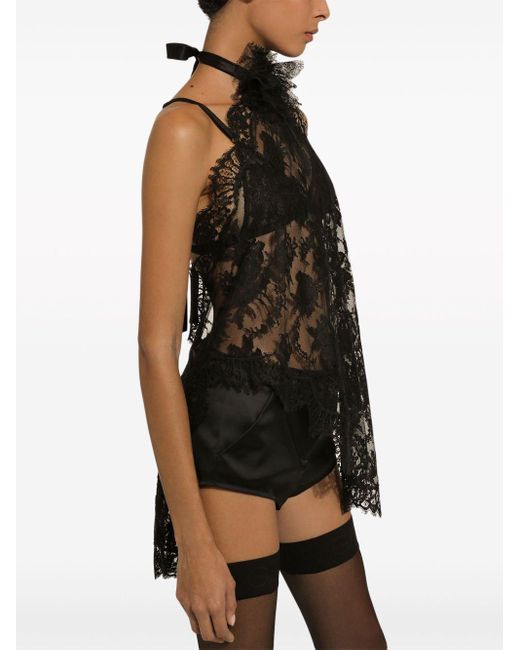 Blusa asimétrica con encaje floral Dolce & Gabbana de color Black