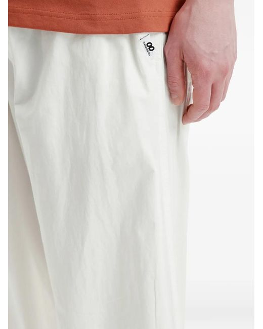 Chocoolate White Logo-Patch Trousers for men