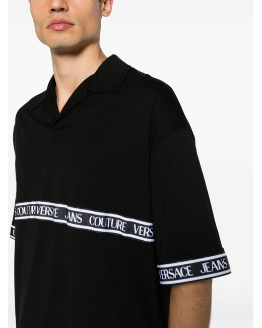 Polo en coton à bande logo Versace pour homme en coloris Black