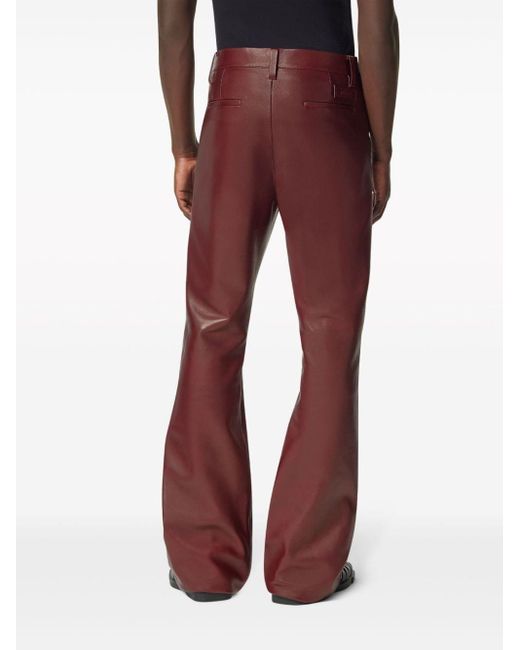 Pantalon évasé en cuir Versace pour homme en coloris Red