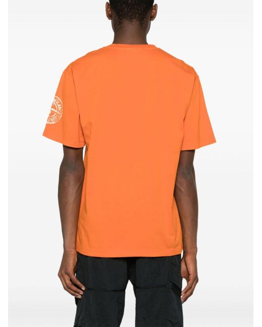 Camiseta con logo estampado Stone Island de hombre de color Orange